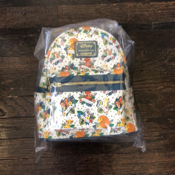 Loungefly x Disney lion king tattoo mini back pack white multi NWT - Picture 9 of 9
